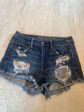 American Eagle Outfitters Dark Blue Distressed Denim Shorts with Lace Patches